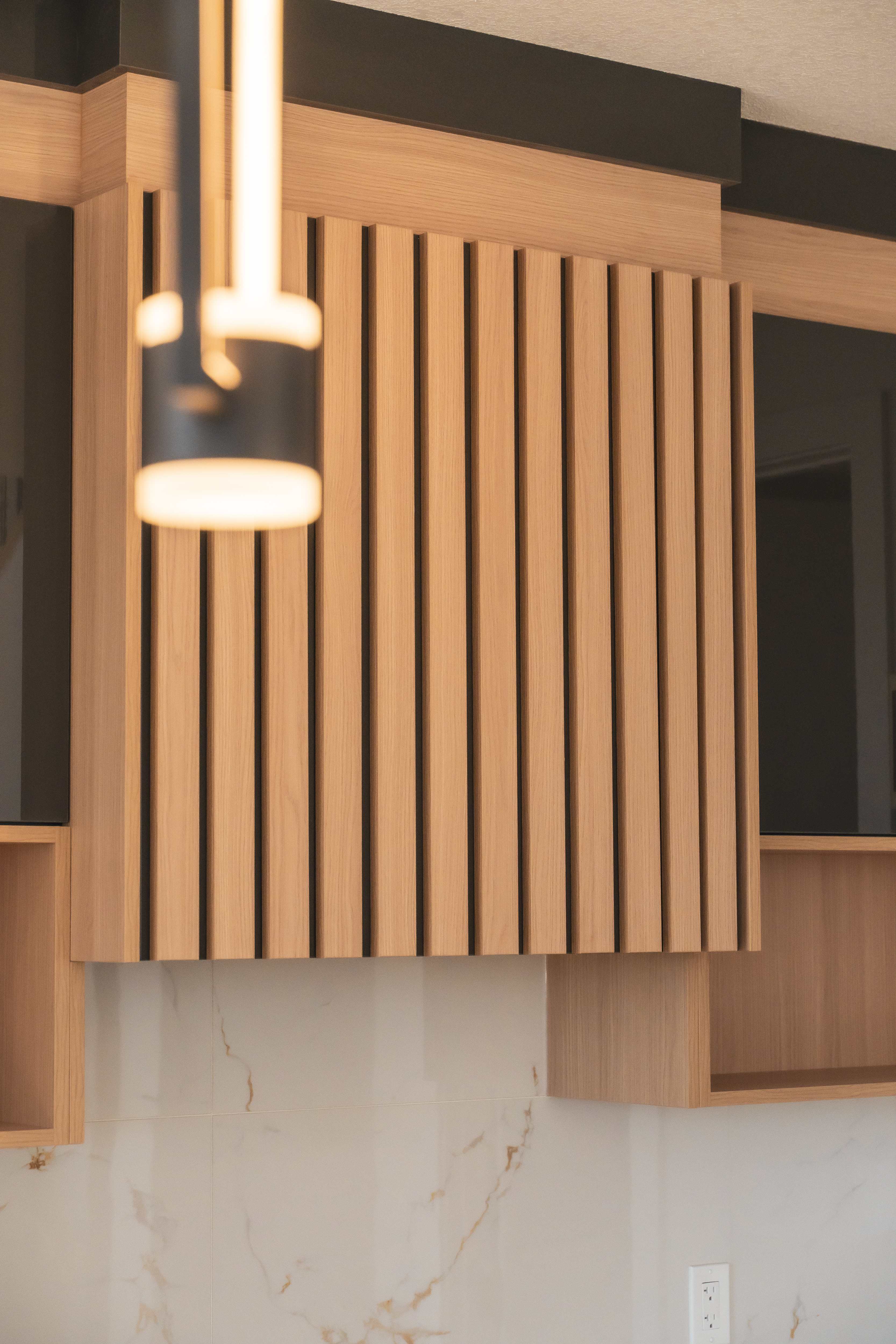 Kitchen island with stools and pendant lighting – ACE Custom Cabinets