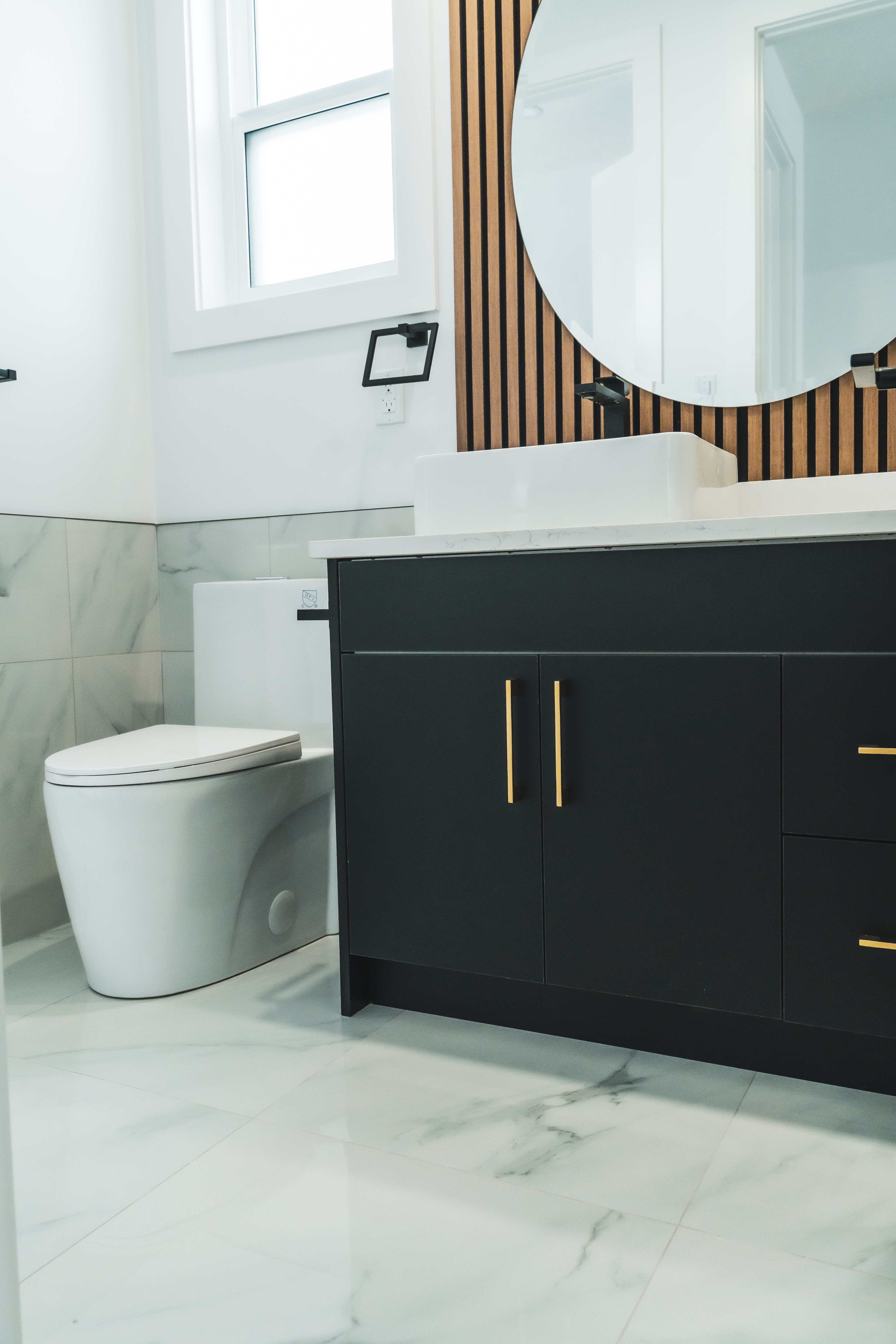 Modern vanity with vessel sink and gold hardware – ACE Custom Cabinets