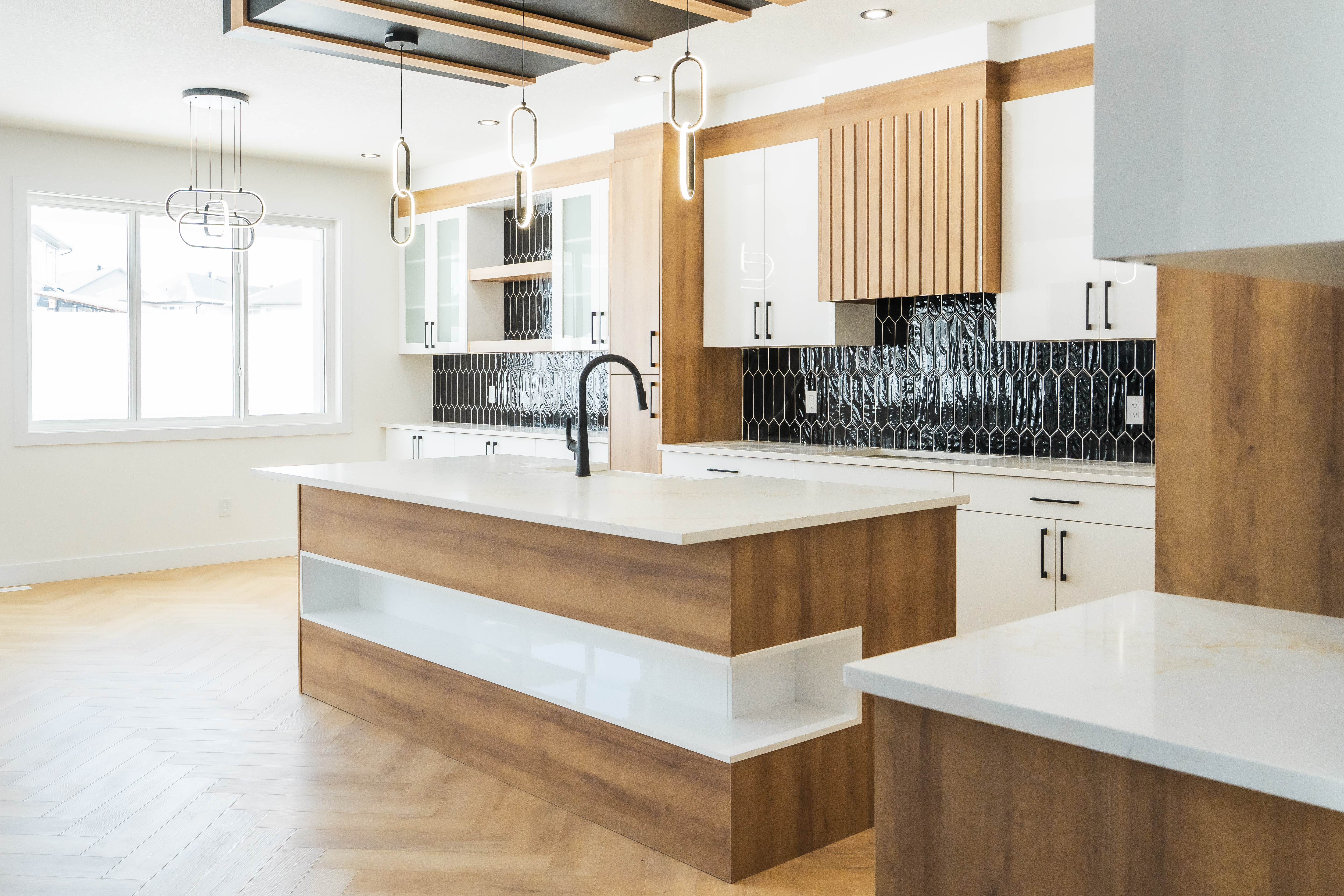 Contemporary kitchen with wood island and black tile backsplash – ACE Custom Cabinets